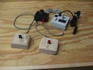 Adapted joystick, switch access box, and switches 